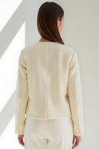 Miano® | Court dress in plain bouclée with contrasting boutons